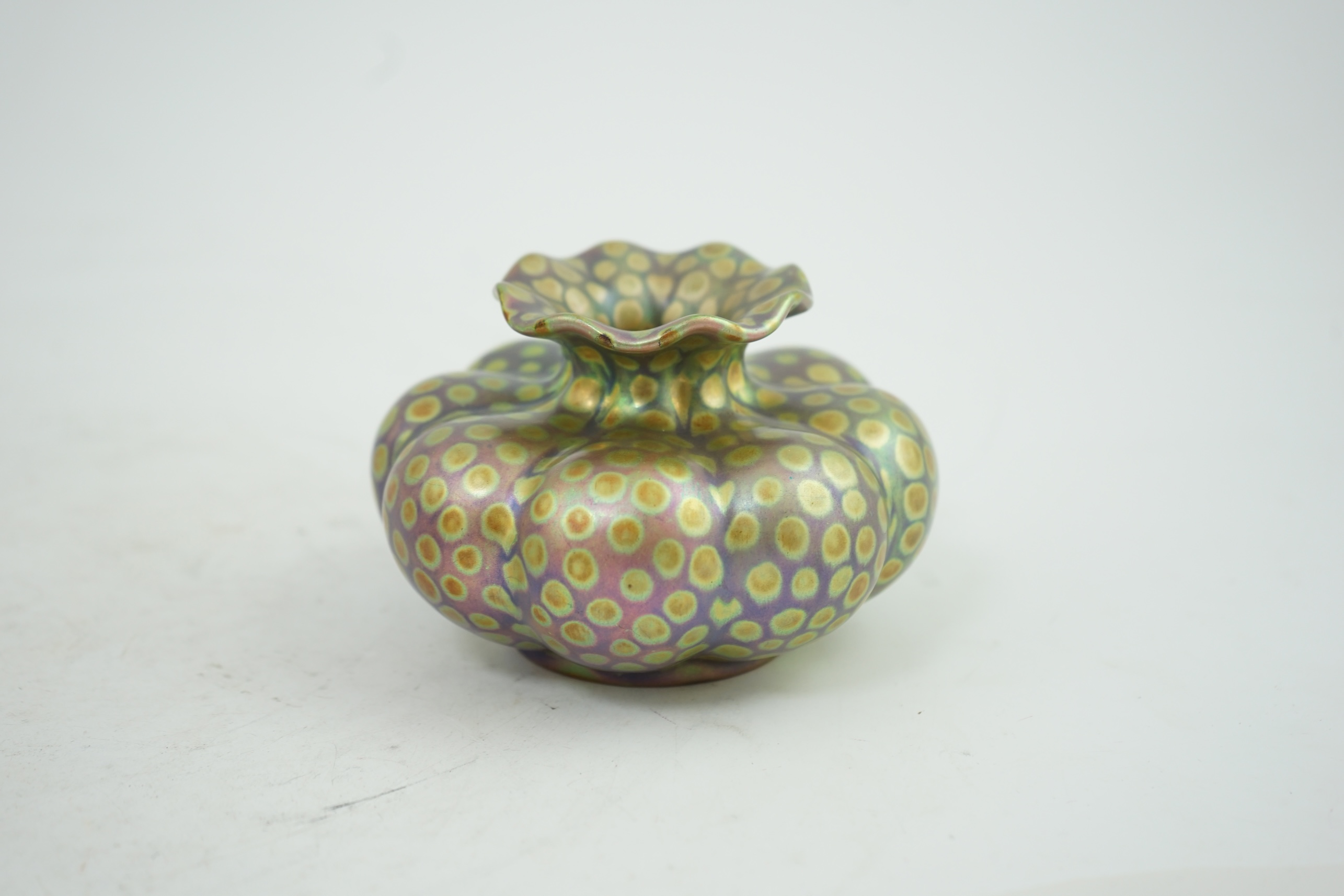 A Zsolnay spotted lustre pumpkin shaped vase, early 20th century